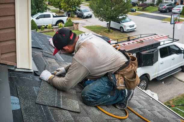 Professional Flat Roof Repair technician working in Oakwood, OK
